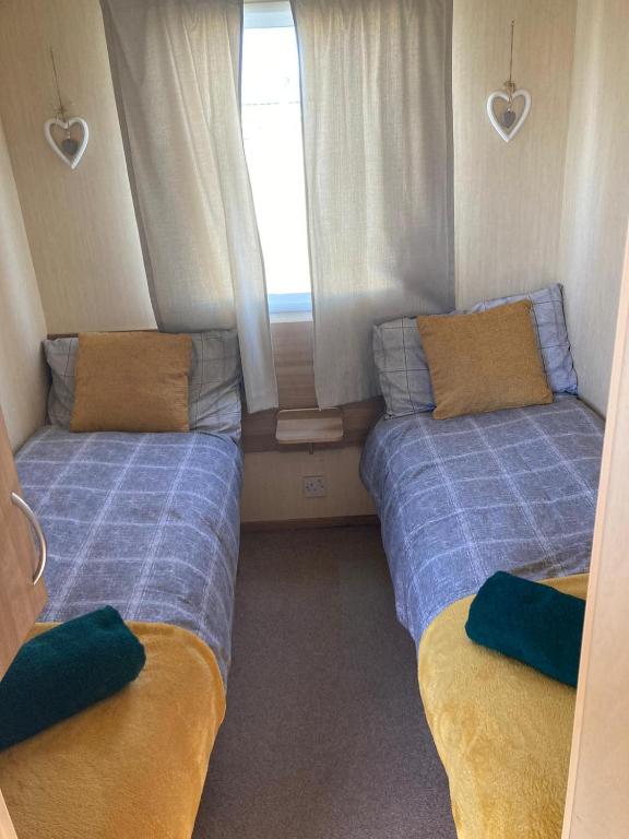 Postel nebo postele na pokoji v ubytování 367 Caravan