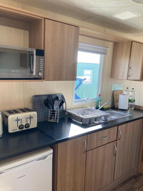 Kuchyň nebo kuchyňský kout v ubytování 367 Caravan