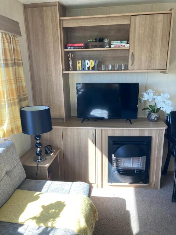 TV a/nebo společenská místnost v ubytování 367 Caravan