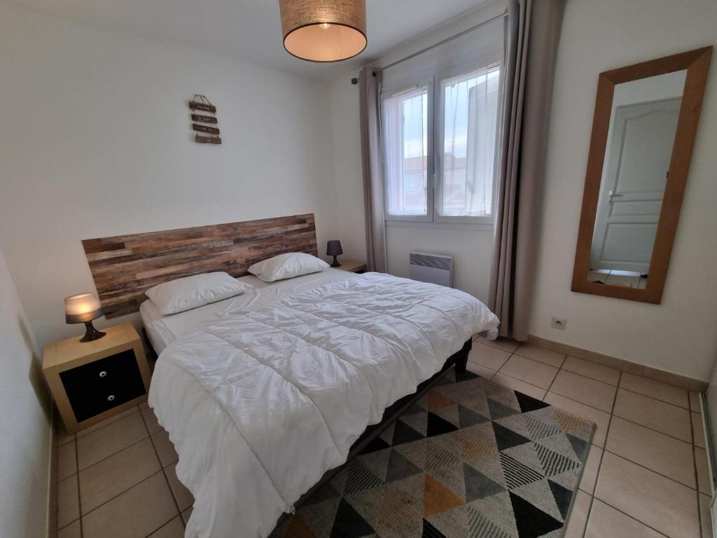 Łóżko lub łóżka w pokoju w obiekcie Villa confort et cosy 20 minutes d'Espagne