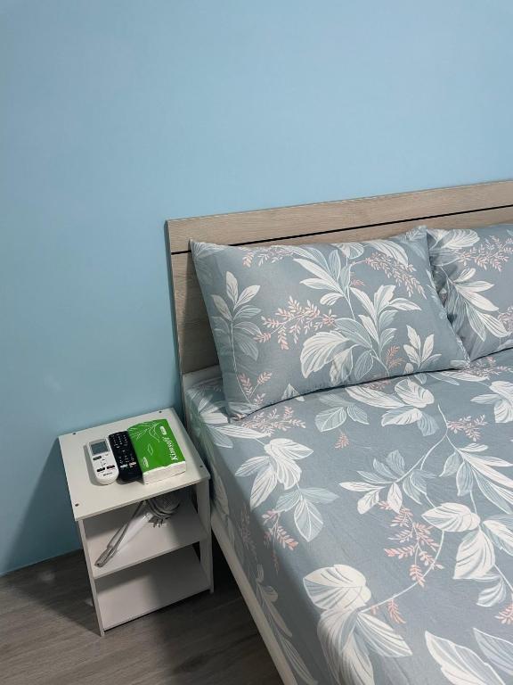 Postel nebo postele na pokoji v ubytování Wen Wen Sub BnB