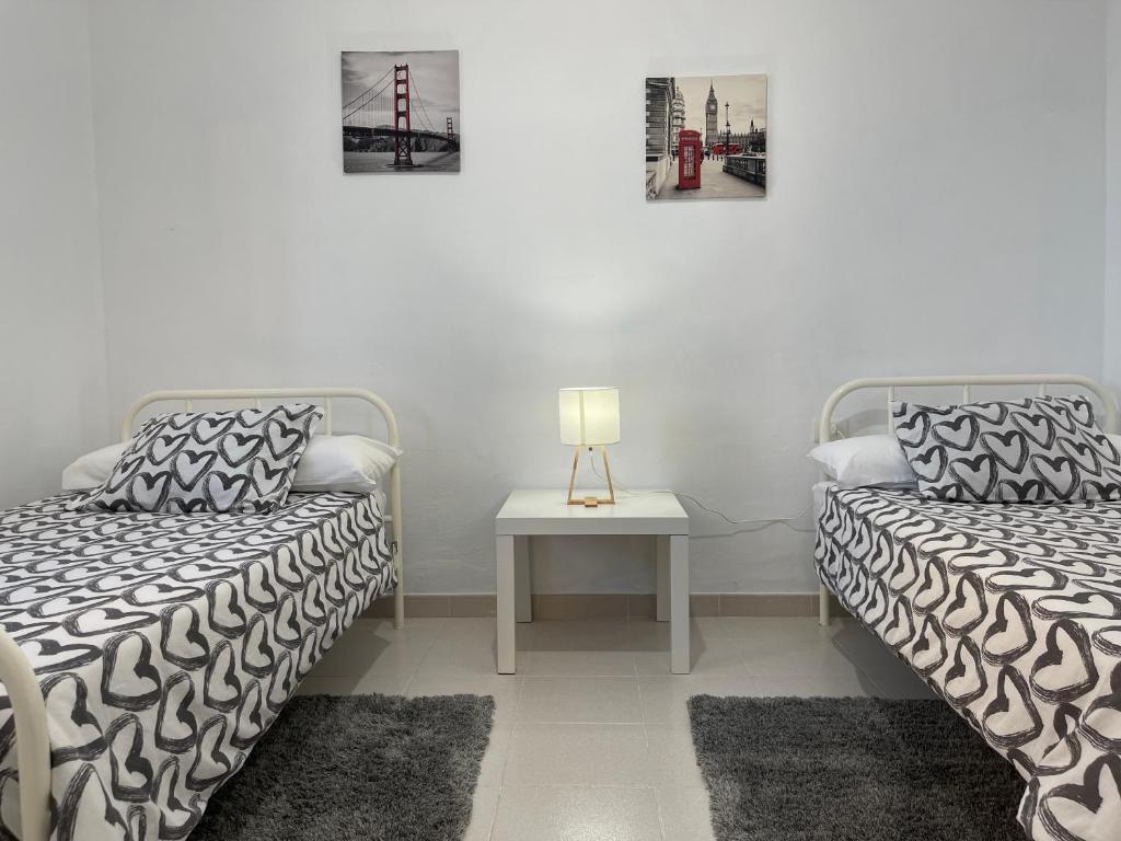 A bed or beds in a room at Low Island House