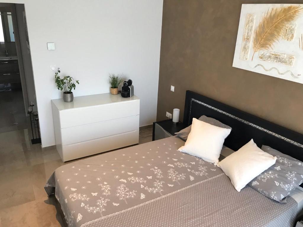Postel nebo postele na pokoji v ubytování Maison LILOMEL