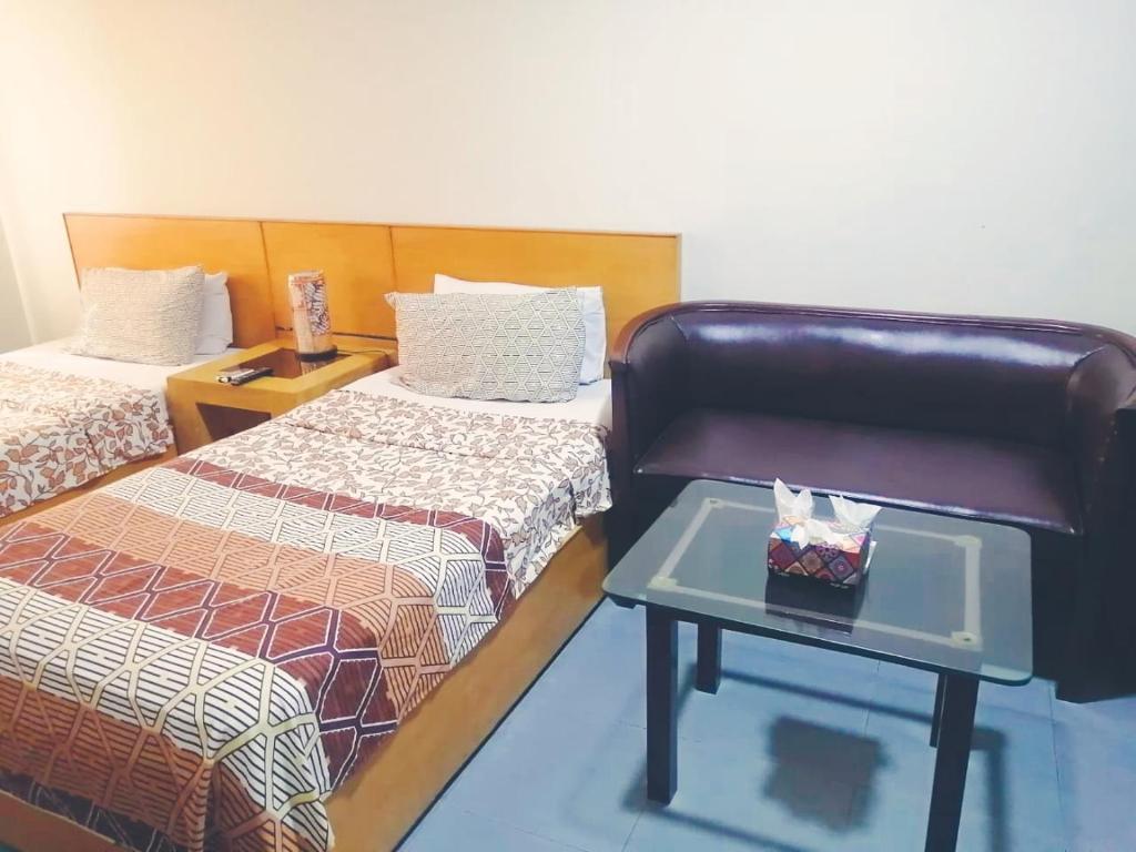 Hotel Rooms DHA - Luxe Tweelingzaal