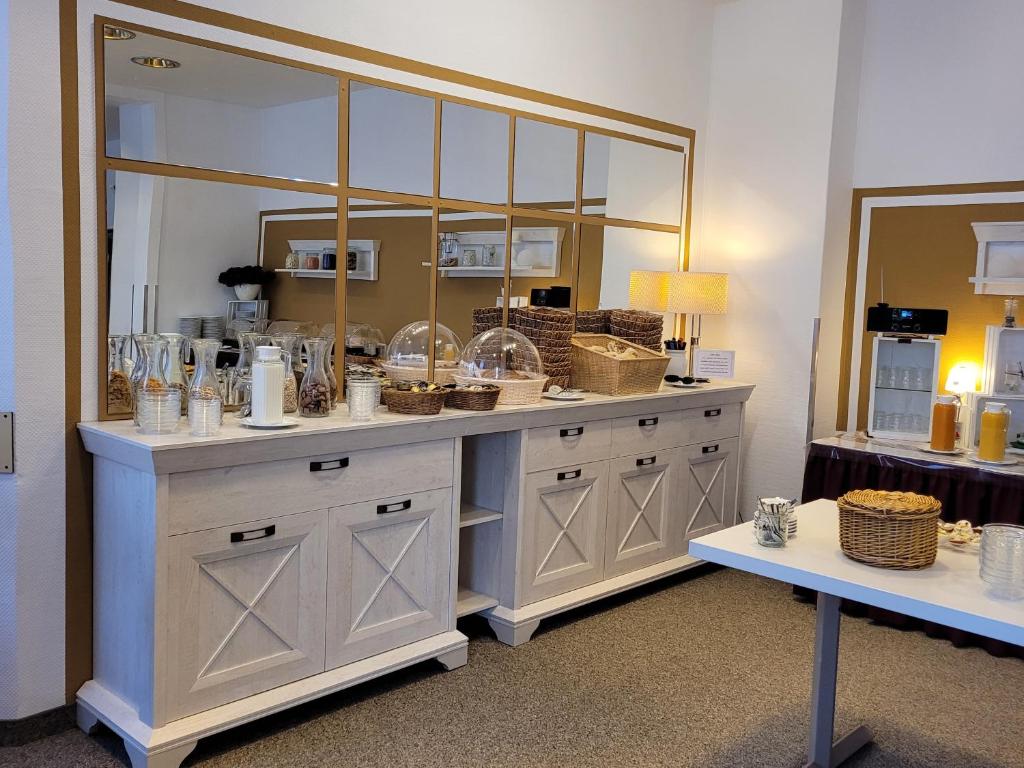 Kuchyň nebo kuchyňský kout v ubytování Hotel Brockenscheideck