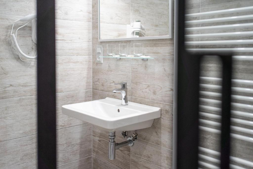 Koupelna v ubytování Apartmány U Jiříka