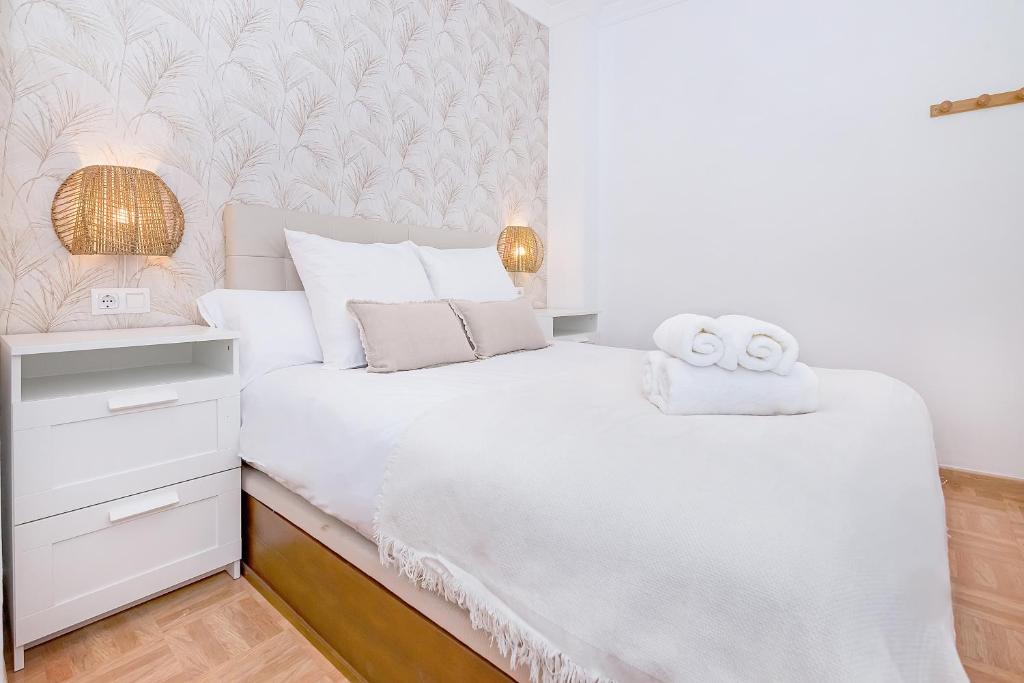 Posteľ alebo postele v izbe v ubytovaní Victoria City Center Apartment