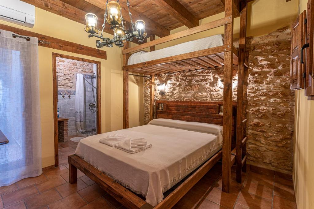 Postel nebo postele na pokoji v ubytování Casa rural, la Bóveda