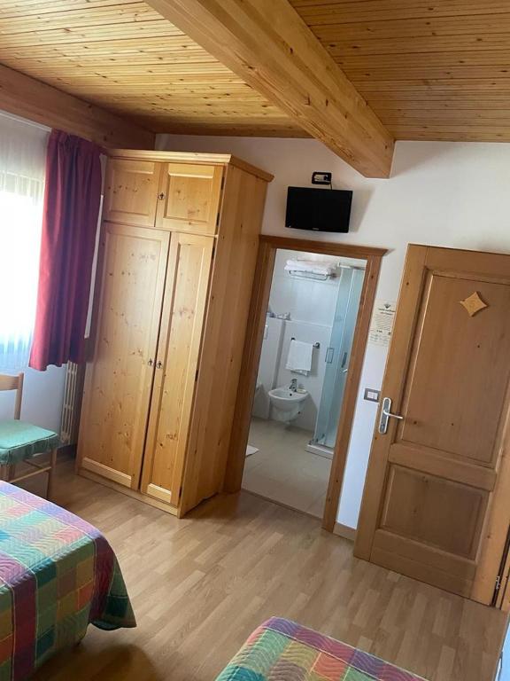 Postel nebo postele na pokoji v ubytování Albergo Ristorante Baraglia