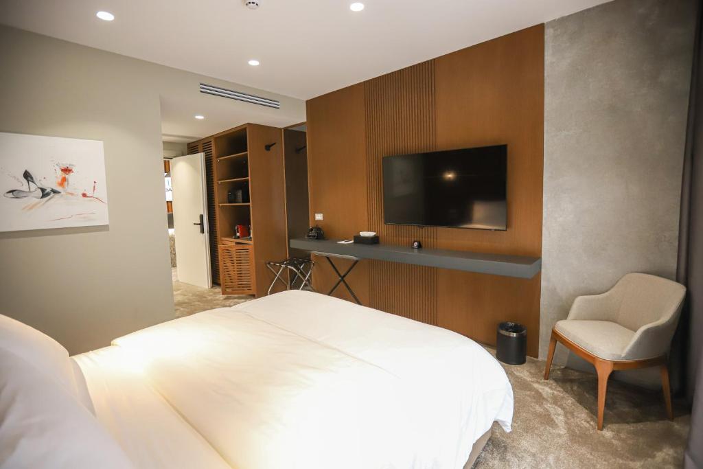 TV a/nebo společenská místnost v ubytování Urbanin Apartment & Hotel
