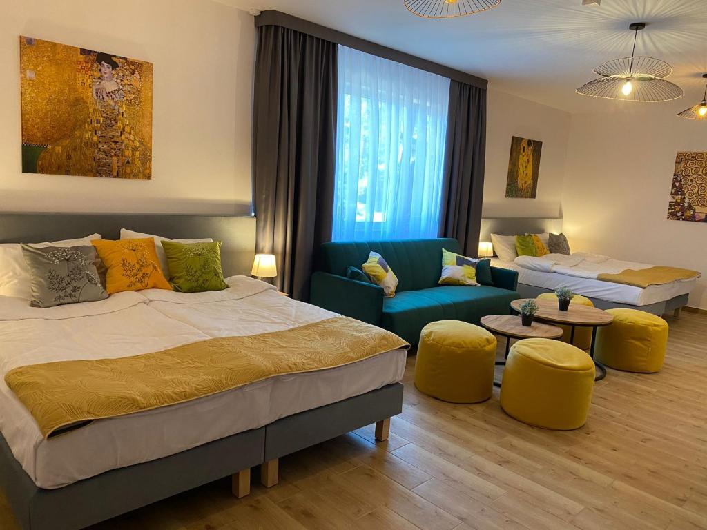 Posteľ alebo postele v izbe v ubytovaní Apartamenty Wakacyjna Wioska Ngô 20m od Suntago