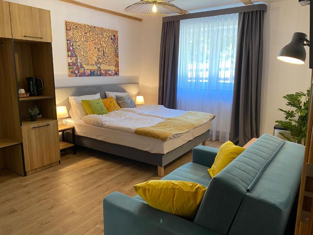 Posteľ alebo postele v izbe v ubytovaní Apartamenty Wakacyjna Wioska Ngô 20m od Suntago