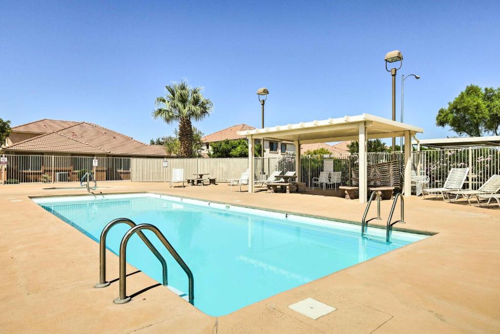 a large swimming pool with a gazebo at Mesquite Desert Retreat Near Golf and Casinos! in Mesquite