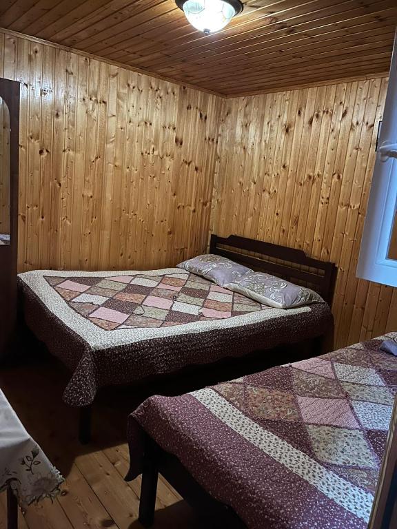 Postel nebo postele na pokoji v ubytování Guest House Yana