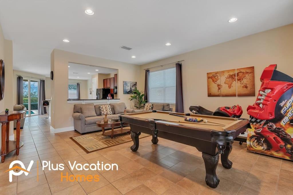 a living room with a pool table in it at 371-Luxury Villa with POOL in Orlando