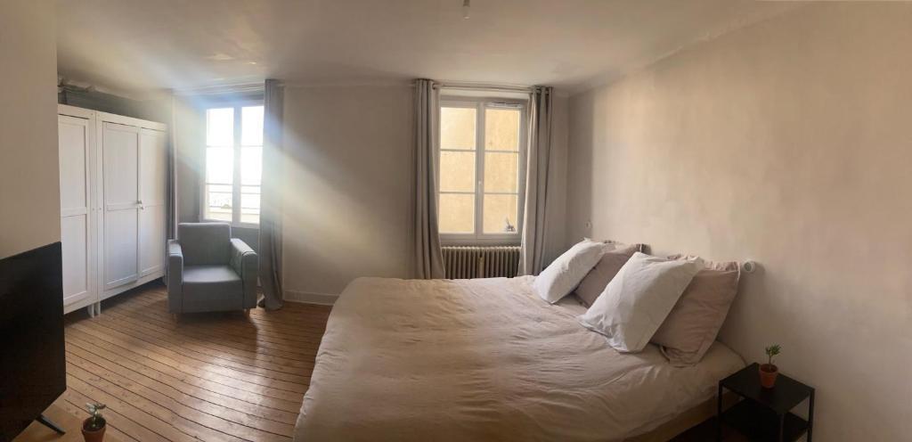 Posedenie v ubytovaní Appartement cosy face à la Mayenne