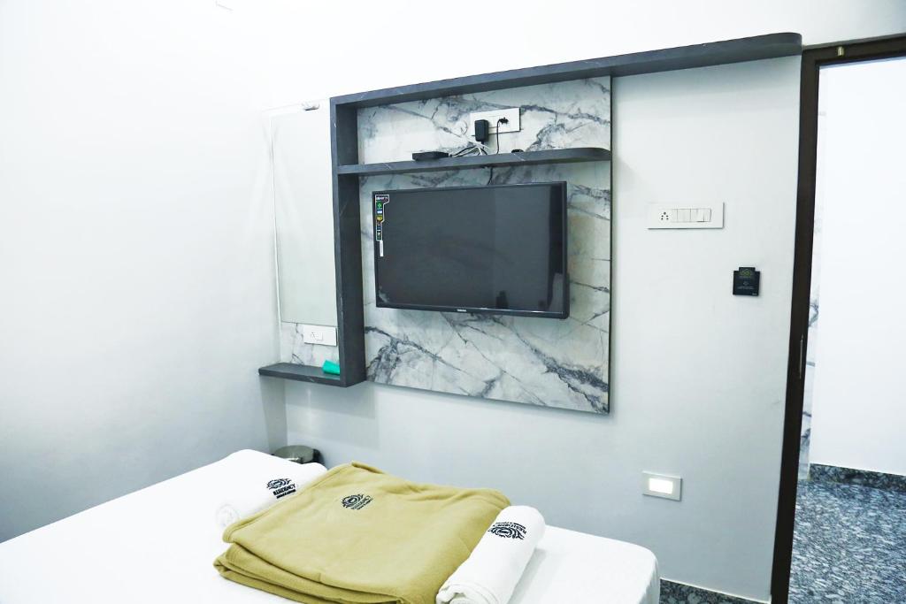 TV a/nebo společenská místnost v ubytování JSM Residency