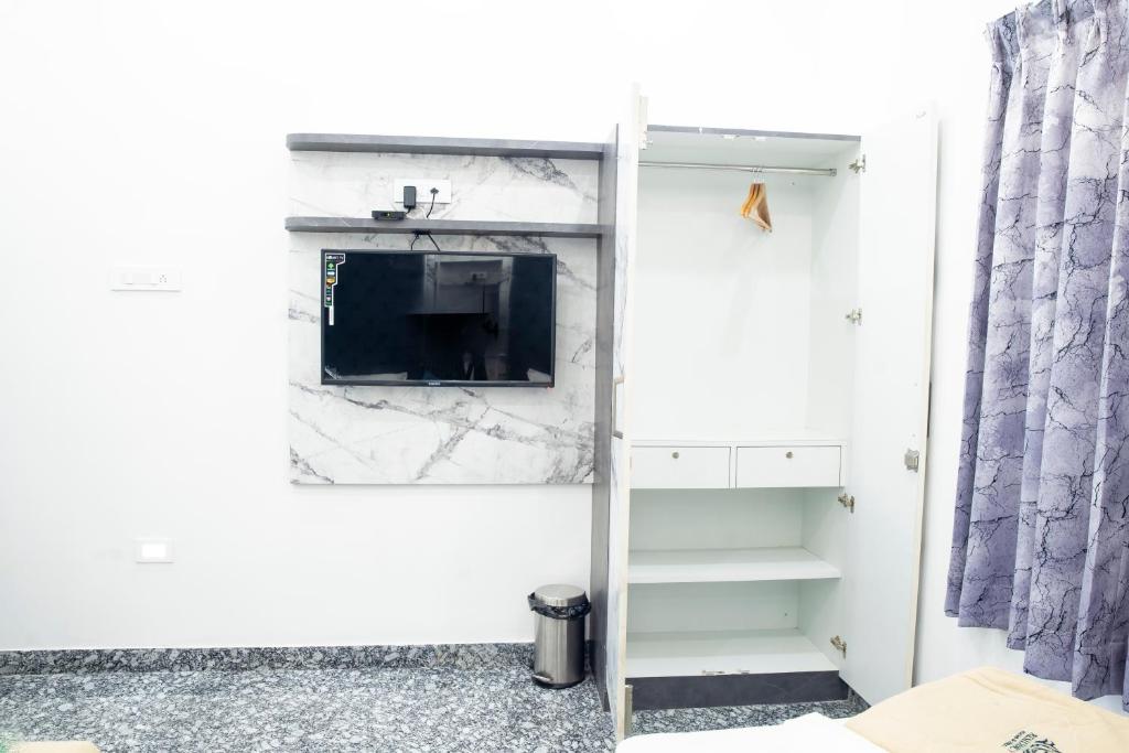 TV a/nebo společenská místnost v ubytování JSM Residency
