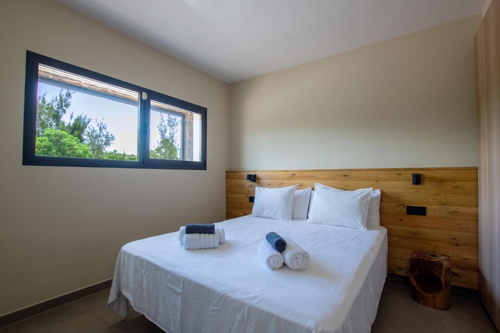Postel nebo postele na pokoji v ubytování North Shore Villas Lajares, VILLA ALEGRE 30A