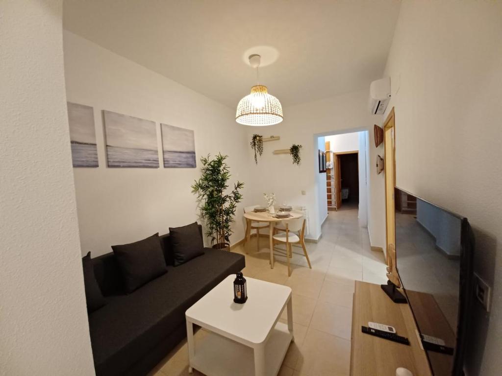 A seating area at For You Rentals TEMPORAL Infantas Gran Via INF2E