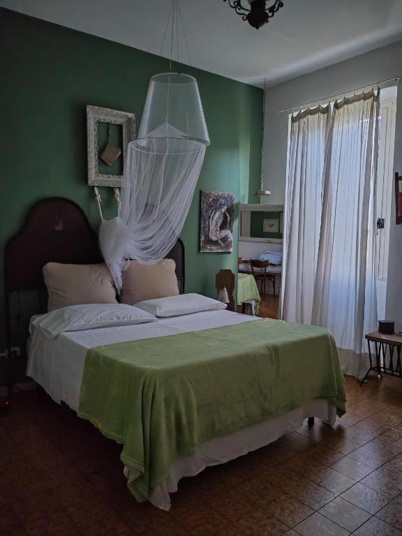 A bed or beds in a room at B&B LaMaGia di Corte Moronati