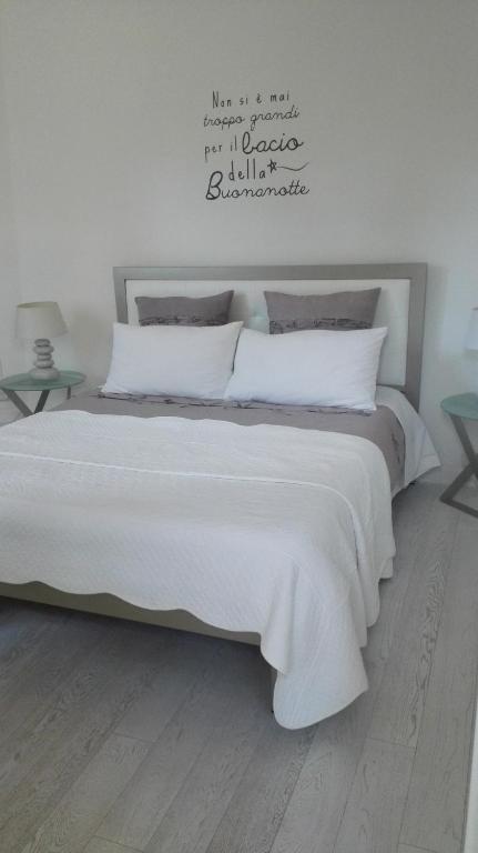 Posteľ alebo postele v izbe v ubytovaní Caterina.C B&B