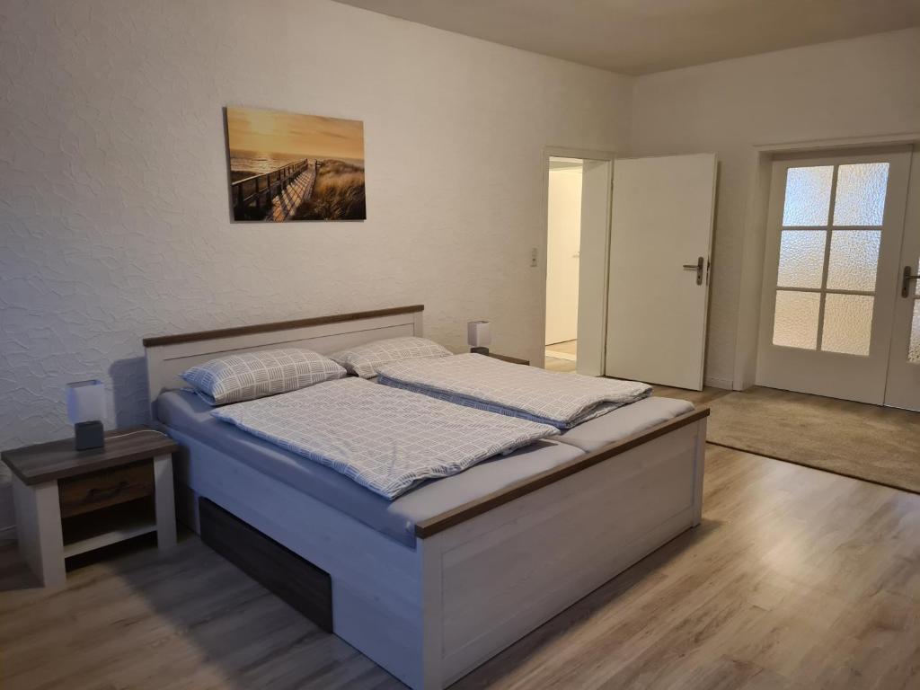 Postel nebo postele na pokoji v ubytování Nordlicht Emden