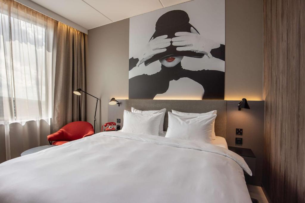 Postel nebo postele na pokoji v ubytování Radisson RED Oslo Økern