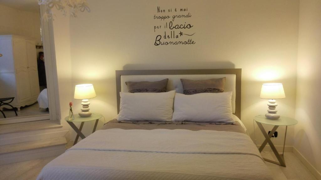 Posteľ alebo postele v izbe v ubytovaní Caterina.C B&B