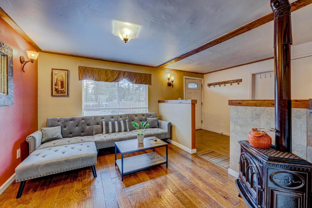 a living room with a couch and a fireplace at Pine Tree Place - Unit 7 in South Lake Tahoe