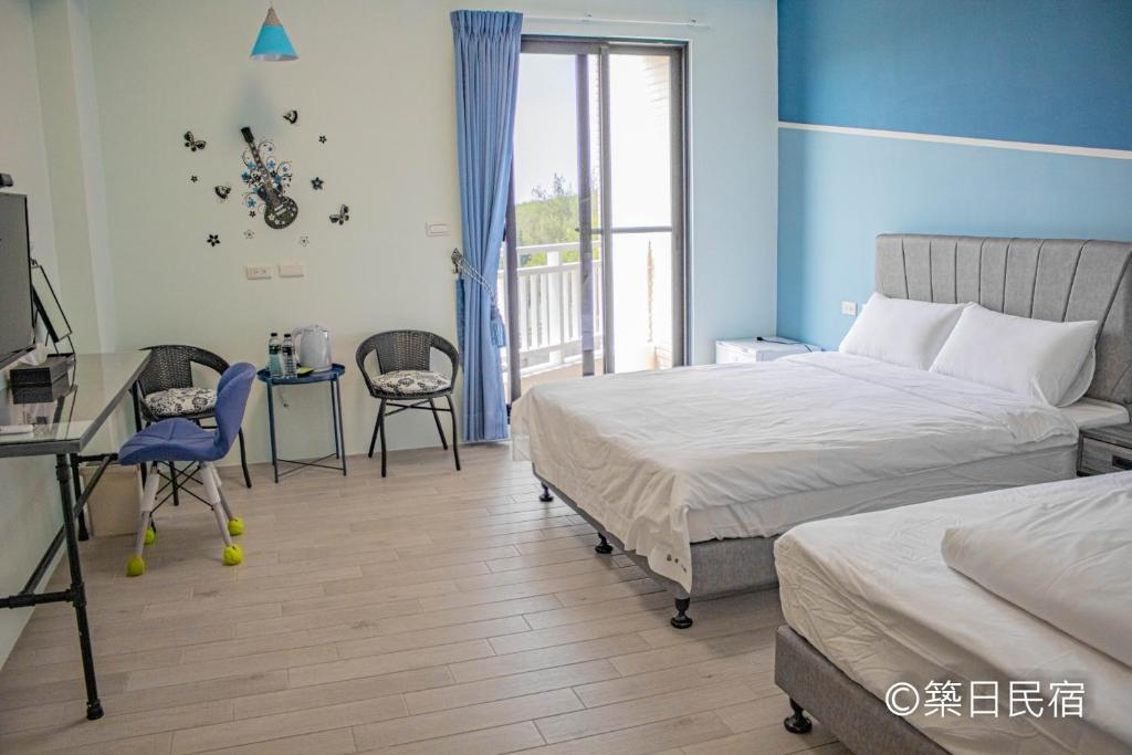 Postel nebo postele na pokoji v ubytování Chikubi Homestay