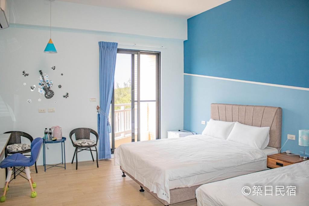 Postel nebo postele na pokoji v ubytování Chikubi Homestay