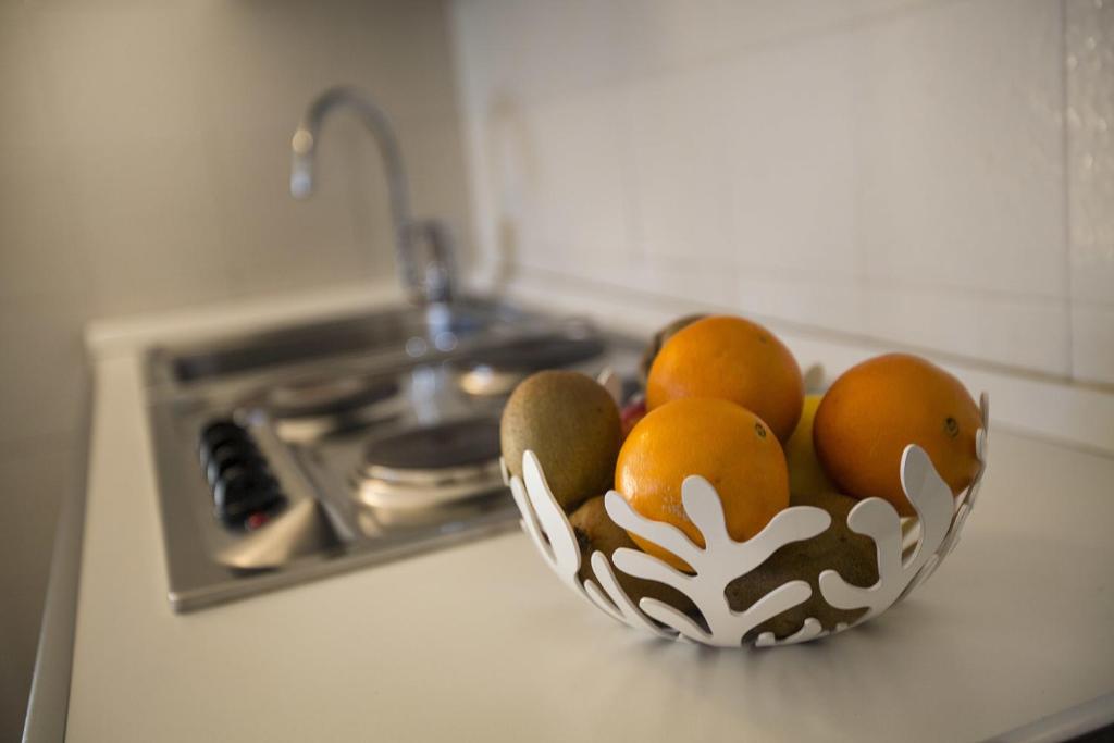 Kuchyň nebo kuchyňský kout v ubytování Le Servite Apartments