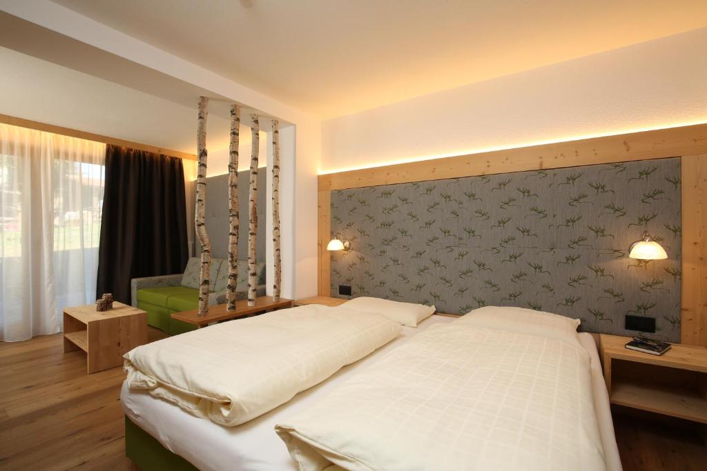 Postel nebo postele na pokoji v ubytování Residence Garni Stella