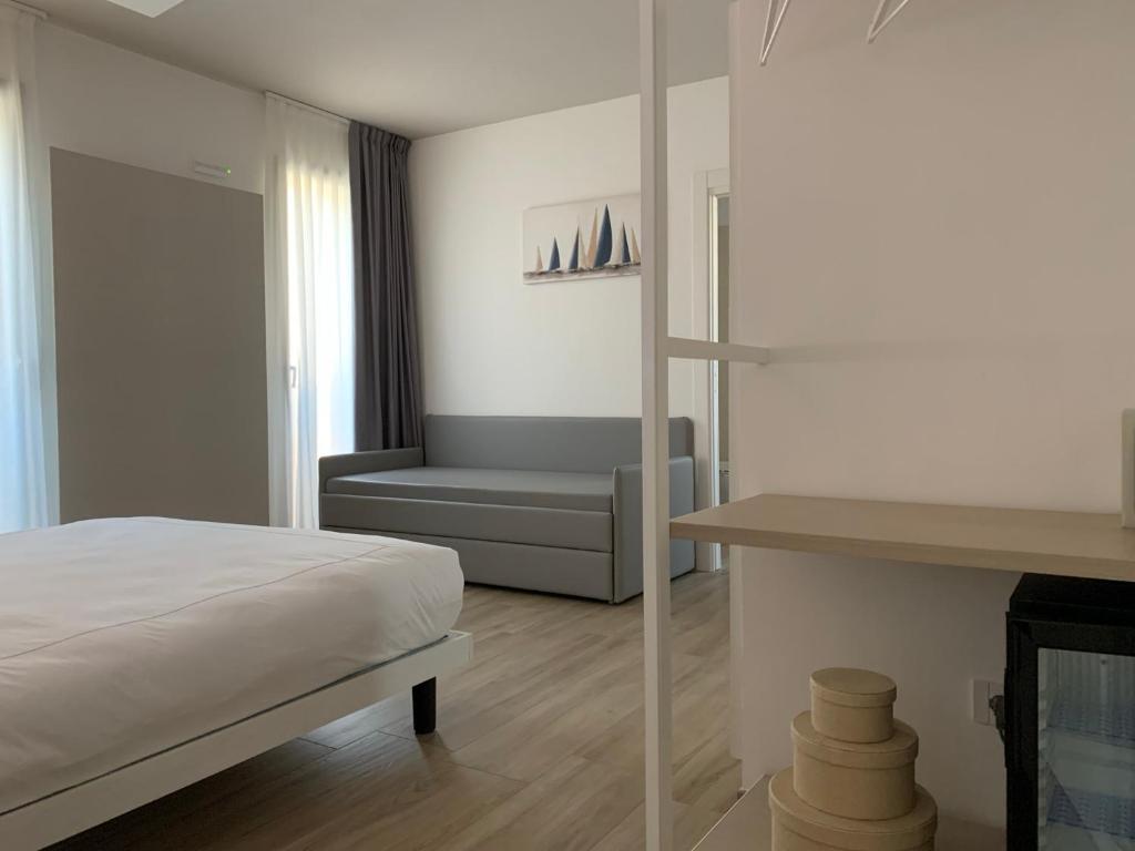 Postel nebo postele na pokoji v ubytování La Casa Di Filò Boutique