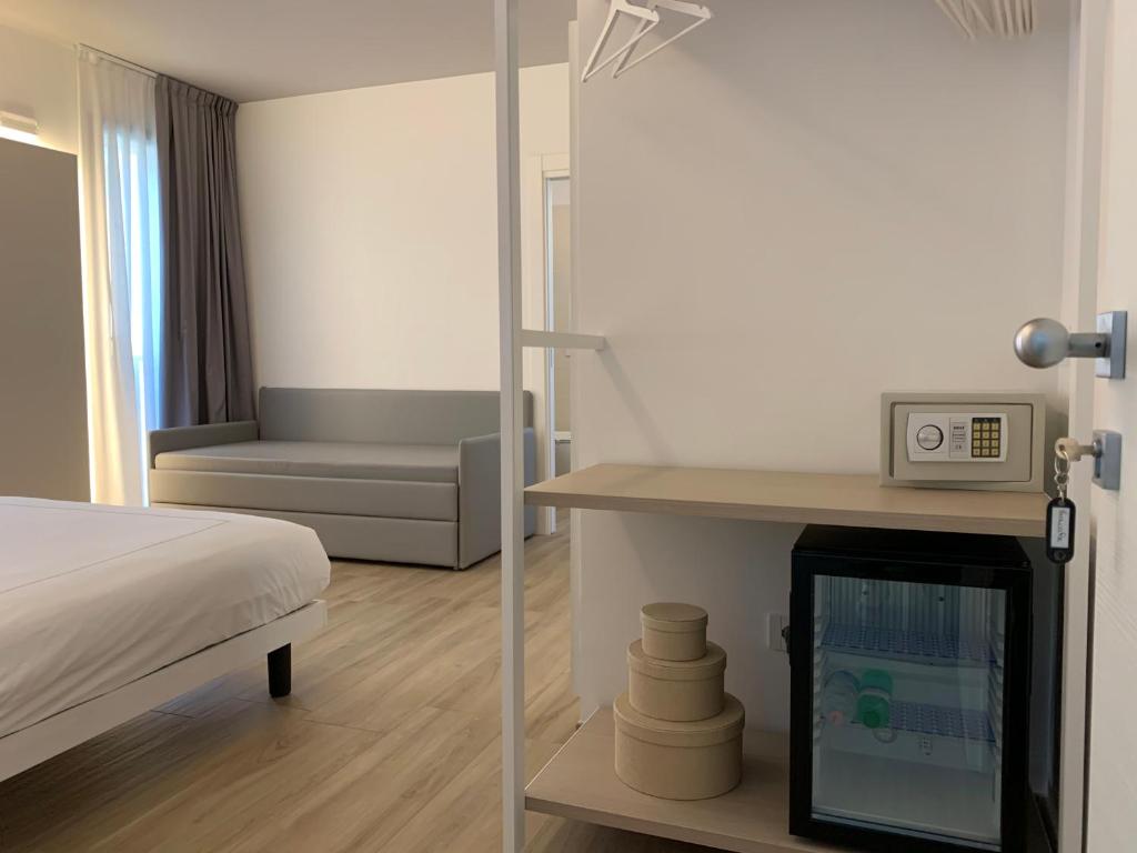 Postel nebo postele na pokoji v ubytování La Casa Di Filò Boutique