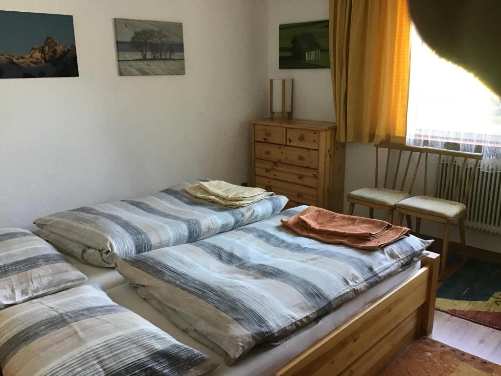 Postel nebo postele na pokoji v ubytování Comfortable apartment in a beautiful surrounding
