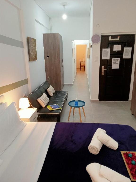A bed or beds in a room at Cozy spot apt next to metro station .