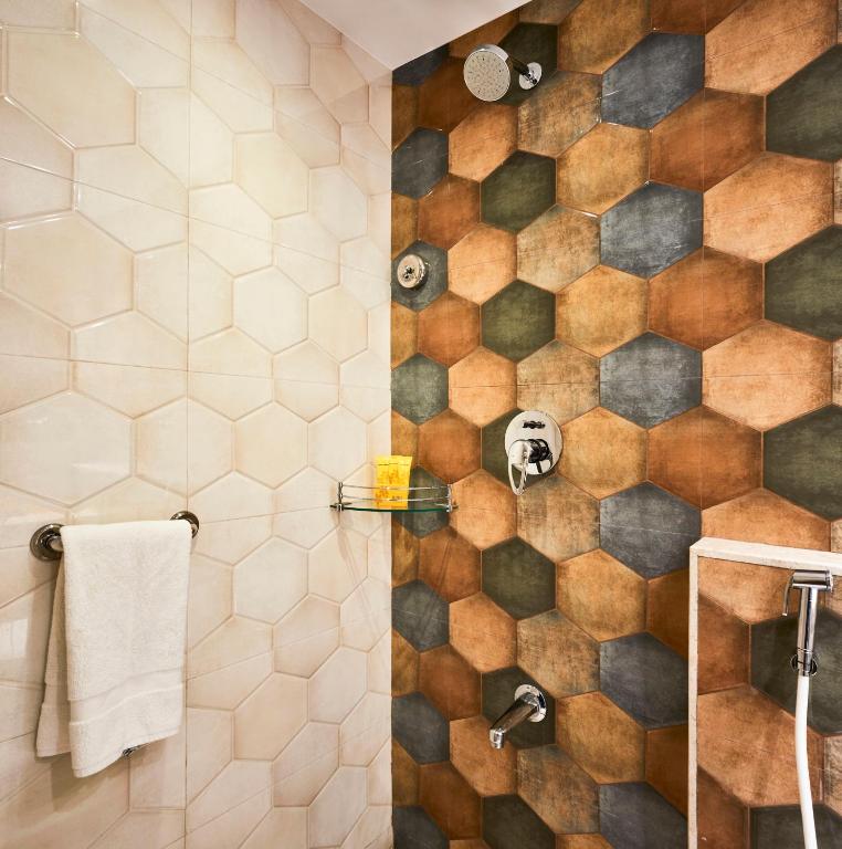 Koupelna v ubytování Hotel Bawa Regency