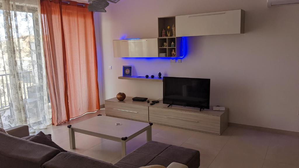 TV a/nebo společenská místnost v ubytování Paradise