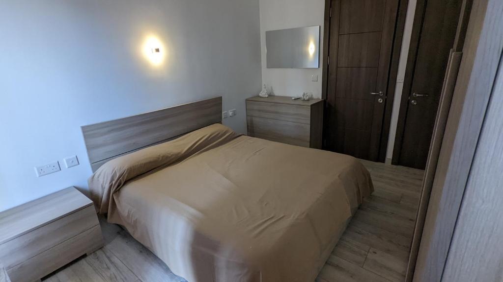 Postel nebo postele na pokoji v ubytování Paradise