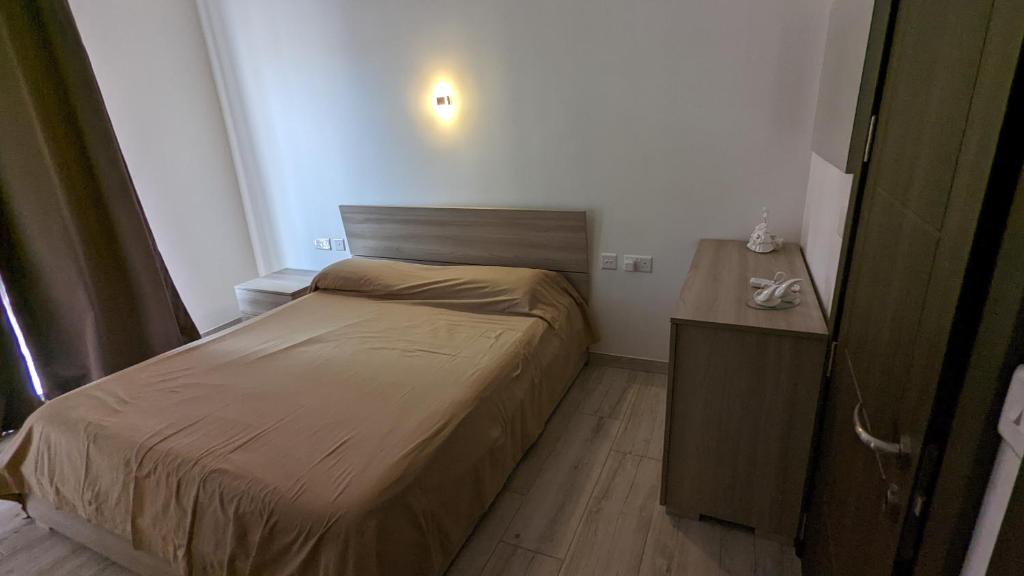 Postel nebo postele na pokoji v ubytování Paradise