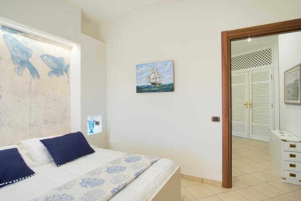 Postel nebo postele na pokoji v ubytování Hotel Caesar Residence & SPA