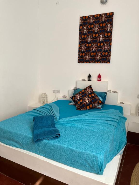 Postel nebo postele na pokoji v ubytování Habibi B&B