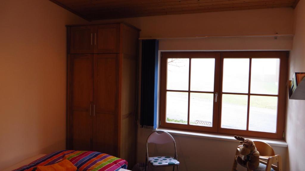 Postel nebo postele na pokoji v ubytování Haus Masonblick