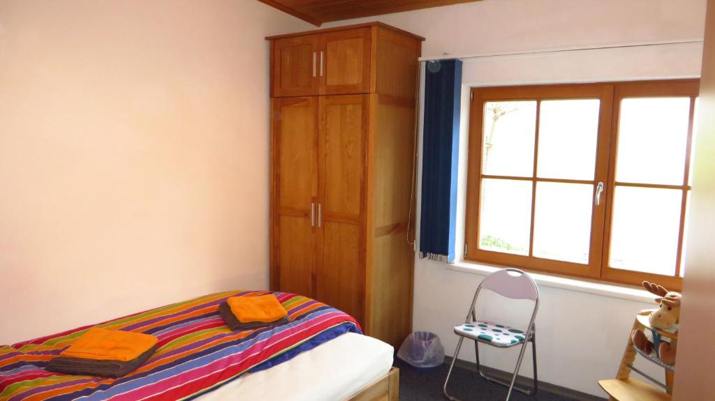 Postel nebo postele na pokoji v ubytování Haus Masonblick