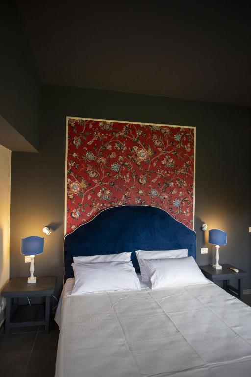 A bed or beds in a room at Citrus, between Etna and the Sea