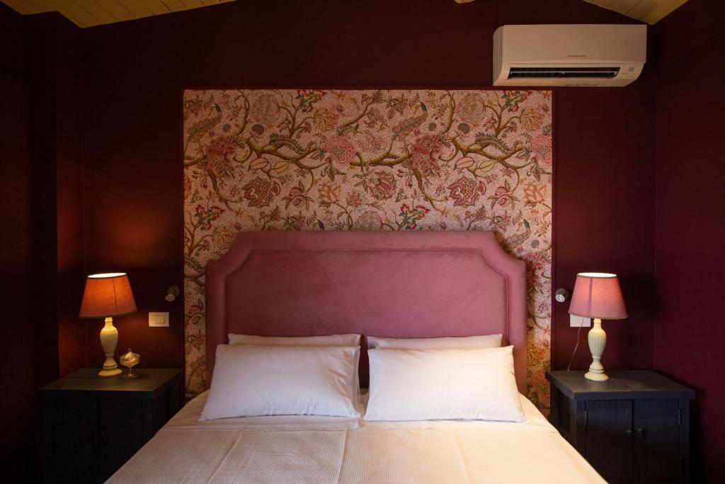 A bed or beds in a room at Citrus, between Etna and the Sea