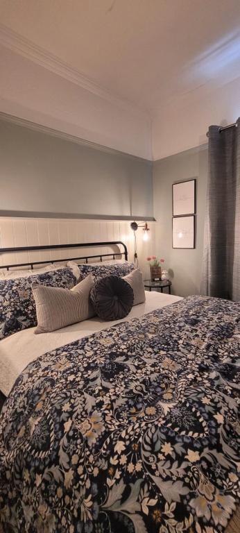 Postel nebo postele na pokoji v ubytování Rigsbys Guesthouse Doncaster