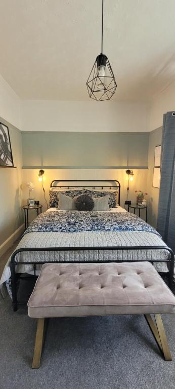 Postel nebo postele na pokoji v ubytování Rigsbys Guesthouse Doncaster